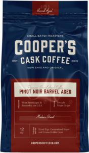 a close up of the label on a bag of pinot noir barrel aged coffee, one of cooper's wine barrel aged coffee chocies