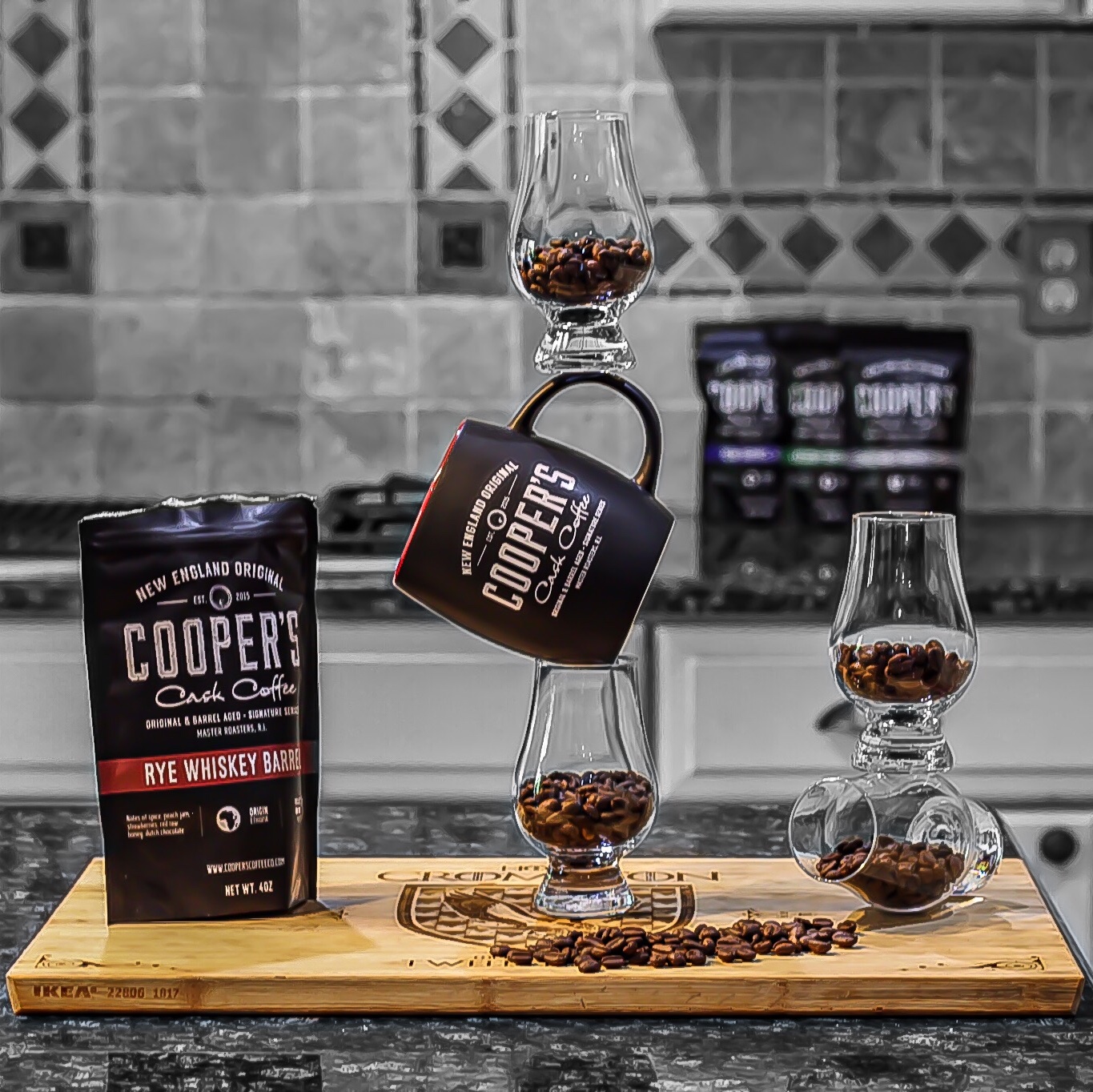 Cooper's Cask bourbon Coffee beans and bag artfully posed before making coffee cocktails
