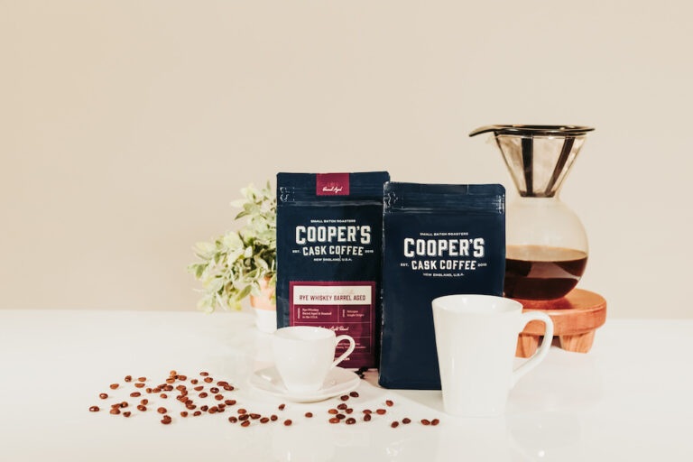 coffee and coffee makers against a black and beige background to show examples of coffee gifts